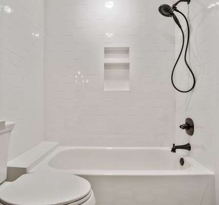 Tub with shower combination
